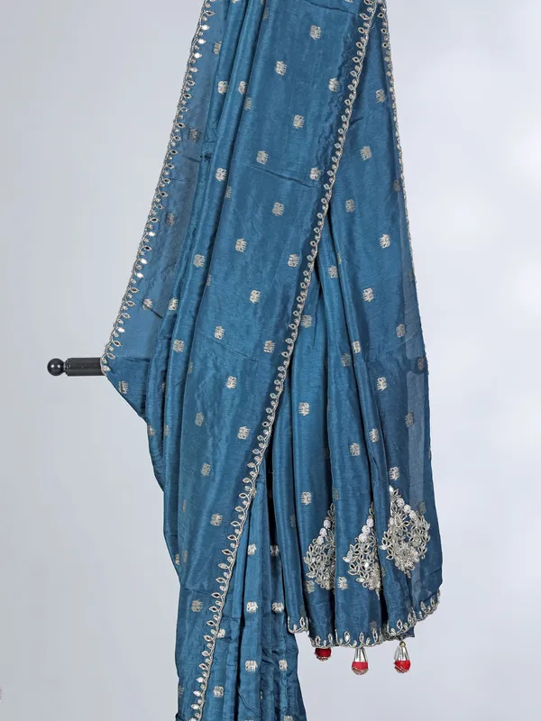 Teal blue dola silk saree with contrast red blouse