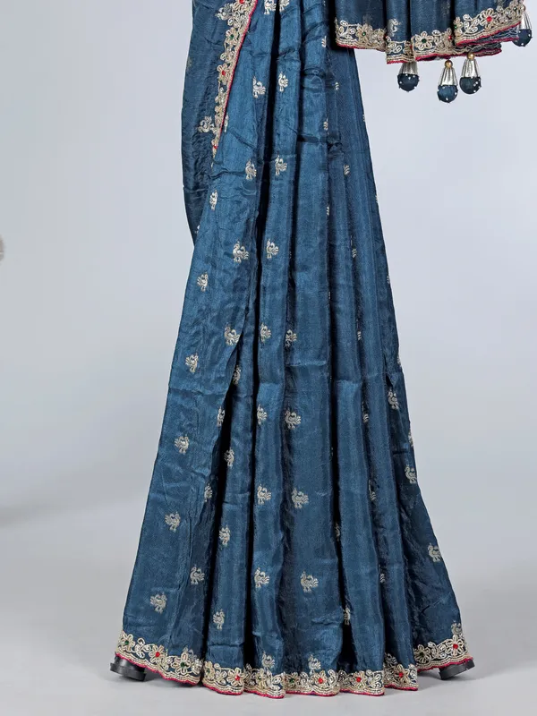 Teal blue festive wear dola silk saree with contrast pink blouse