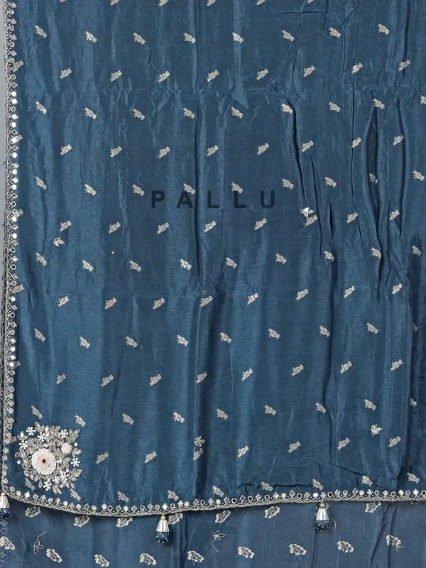 Teal blue festive wear dola silk saree with cutdana embellishment