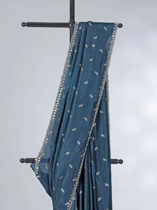 Teal blue festive wear dola silk saree with cutdana embellishment