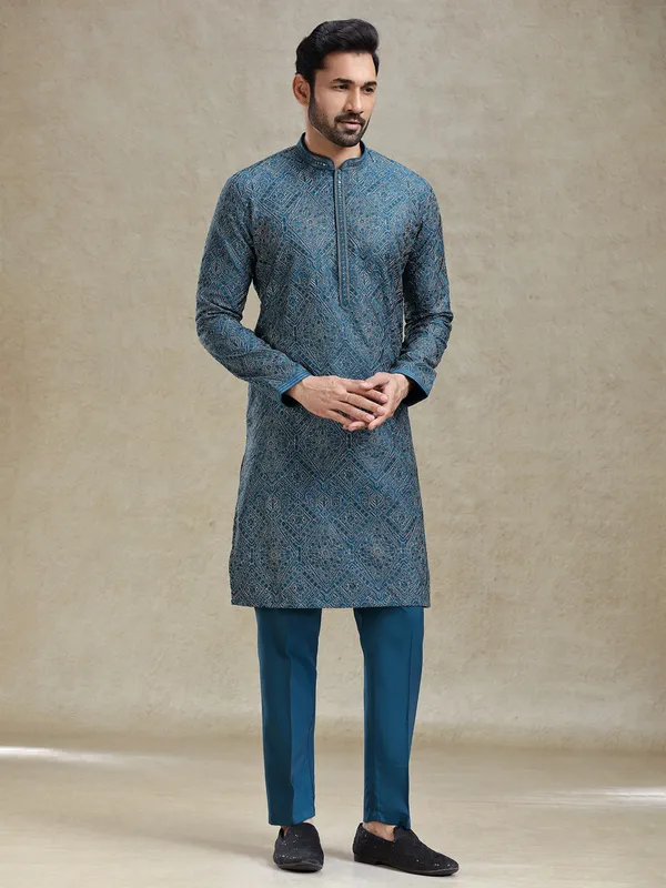 Teal blue kurta set with aabla and embroidery work on yock