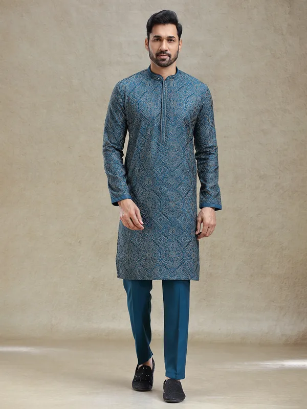 Teal blue kurta set with aabla and embroidery work on yock