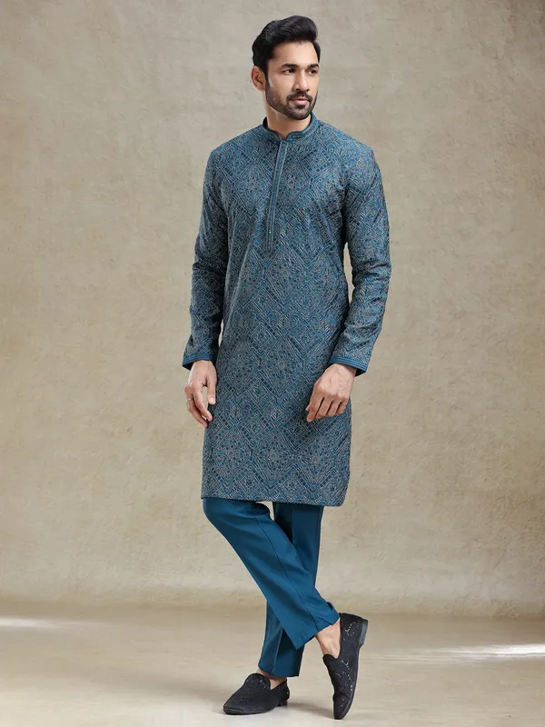 Teal blue kurta set with aabla and embroidery work on yock