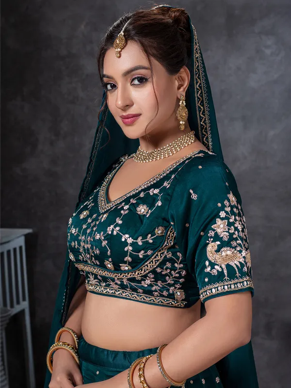 Teal blue lehenga choli with zardosi work