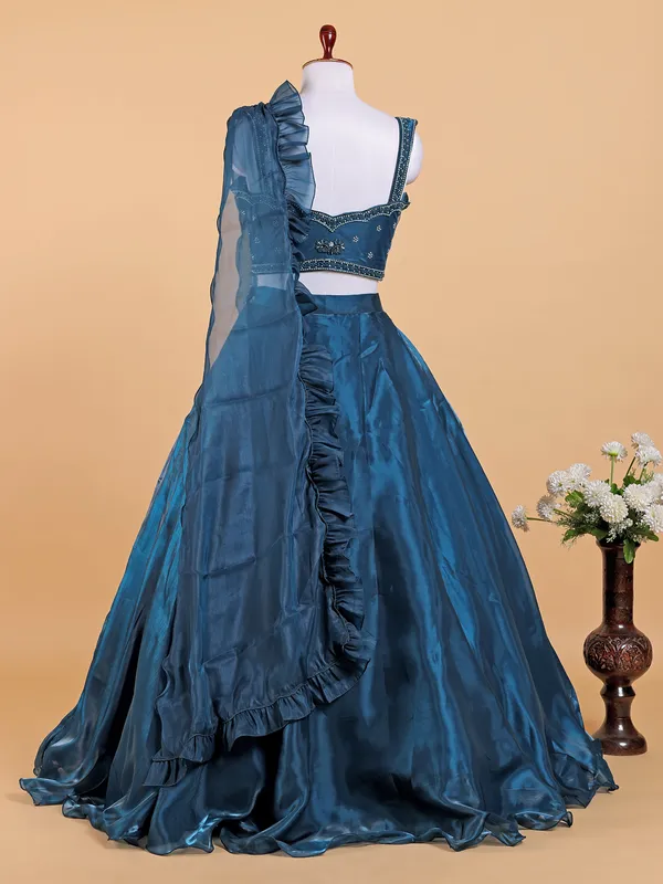Teal blue organza lehenga choli with dupatta