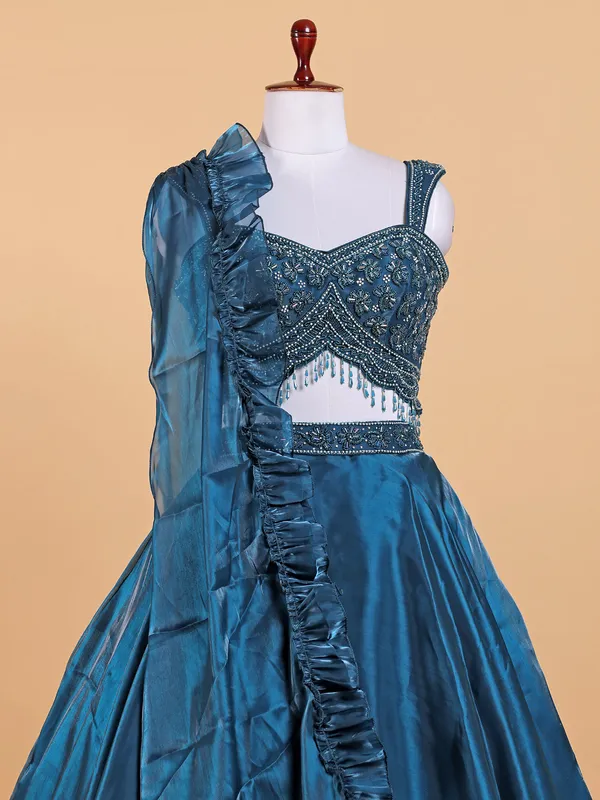Teal blue organza lehenga choli with dupatta