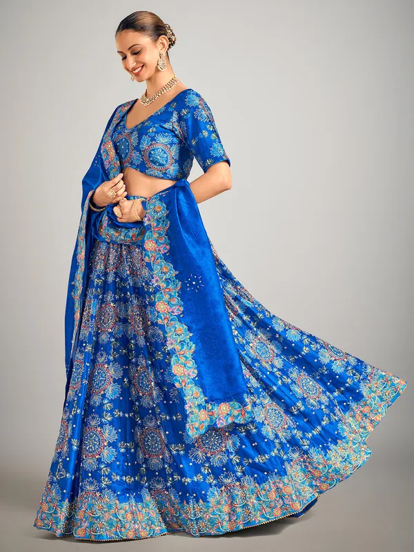 Teal blue printed silk wedding wear lehenga choli