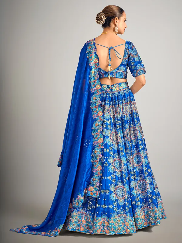 Teal blue printed silk wedding wear lehenga choli