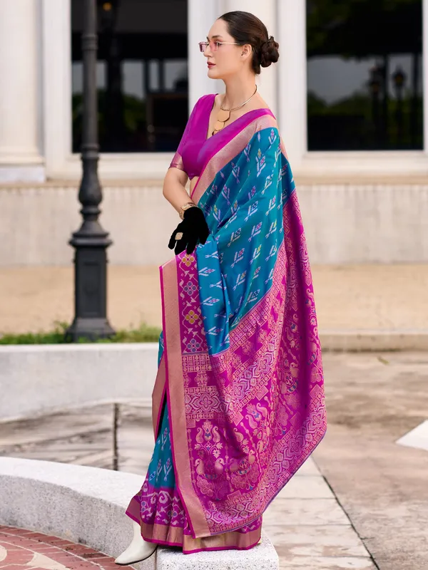 Teal blue saree with contrast border