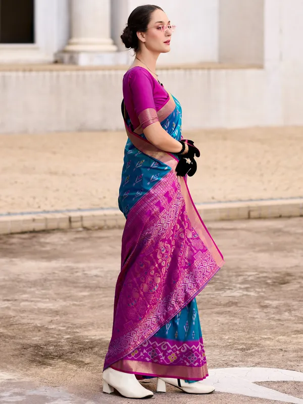 Teal blue saree with contrast border
