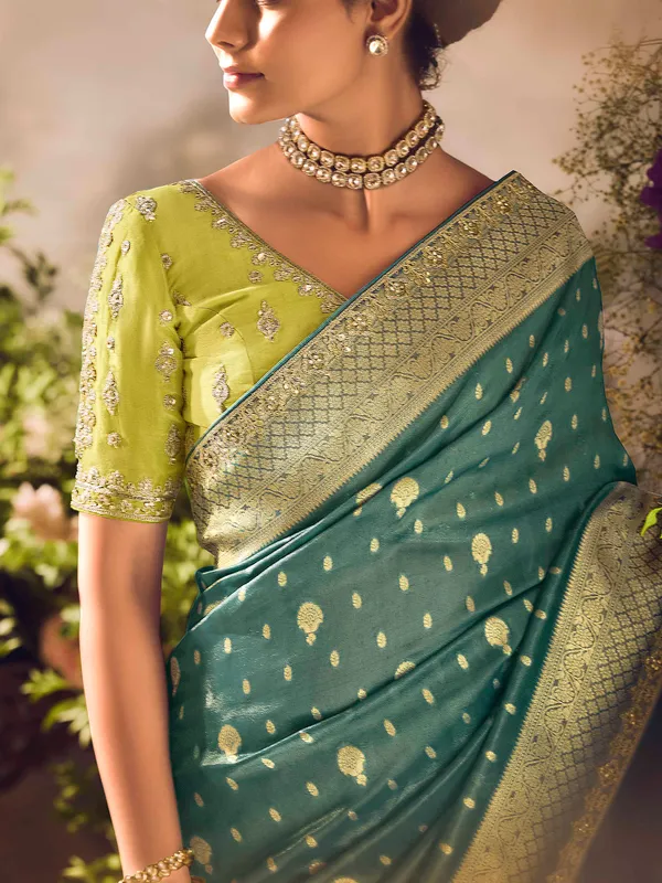 Teal blue saree with intricate banarasi embellishments