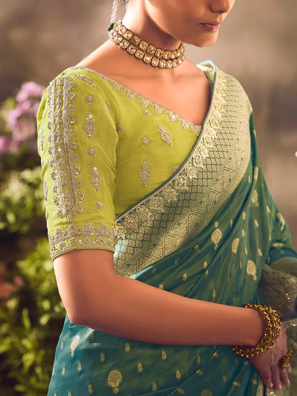 Teal blue saree with intricate banarasi embellishments