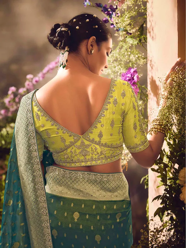 Teal blue saree with intricate banarasi embellishments