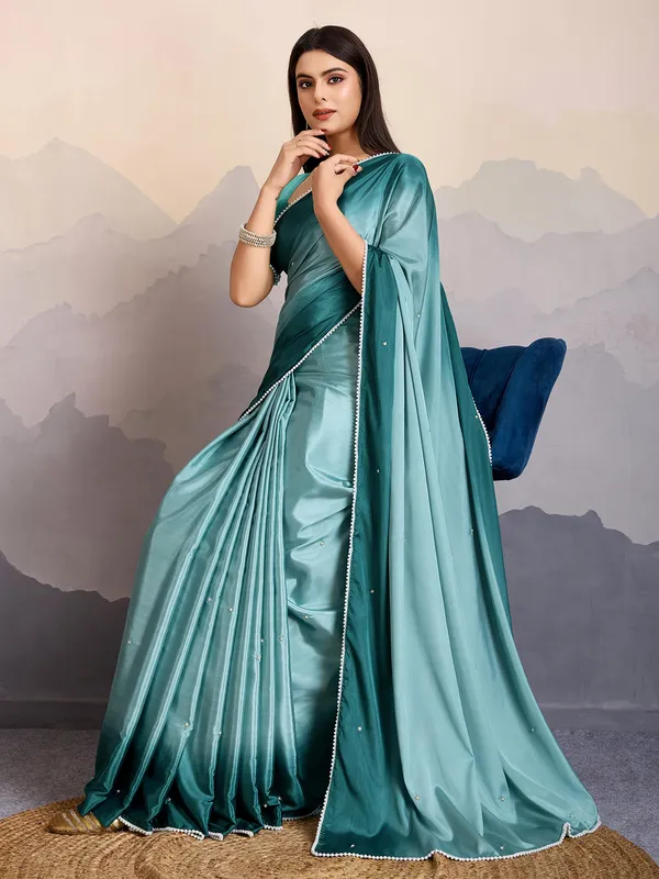 Teal blue satin silk saree for festive parties