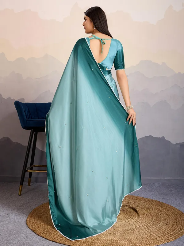 Teal blue satin silk saree for festive parties