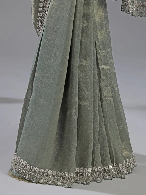 Teal blue tissue silk saree for festive glam