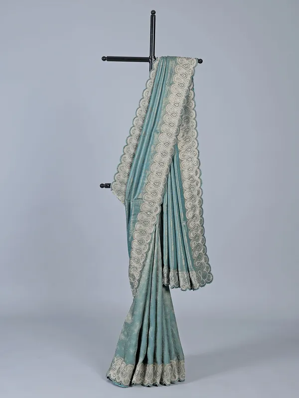 Teal blue tissue silk saree for festive wear