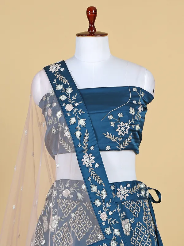 Teal blue unstitched lehenga choli in raw silk