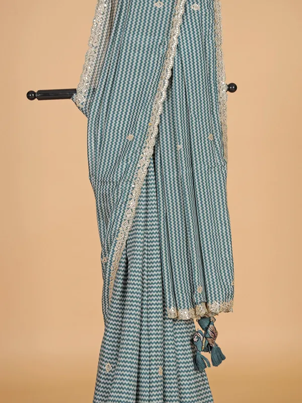 Teal blue zig zag printed saree with ready made
