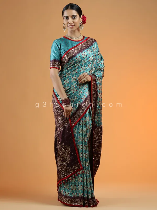 Teal green wedding wear printed saree in modal silk