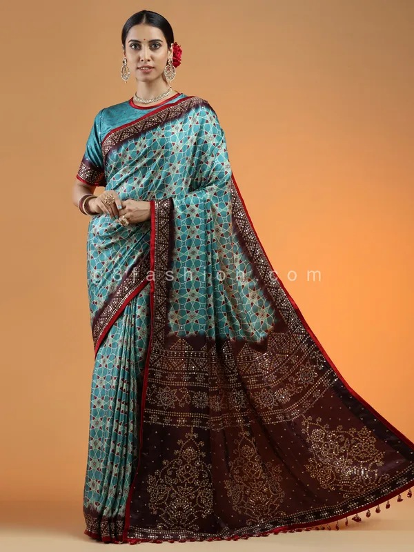 Teal green wedding wear printed saree in modal silk