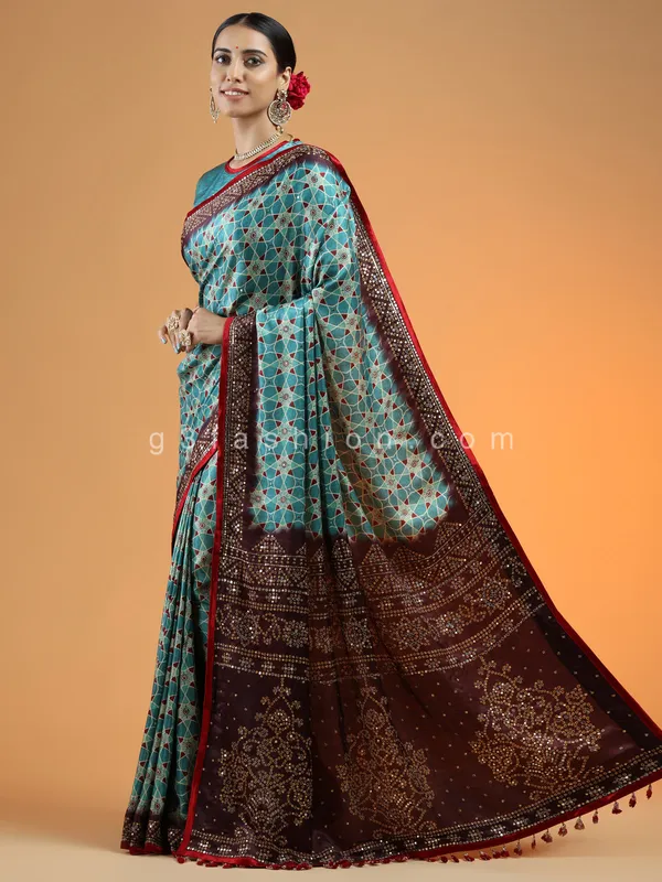 Teal green wedding wear printed saree in modal silk
