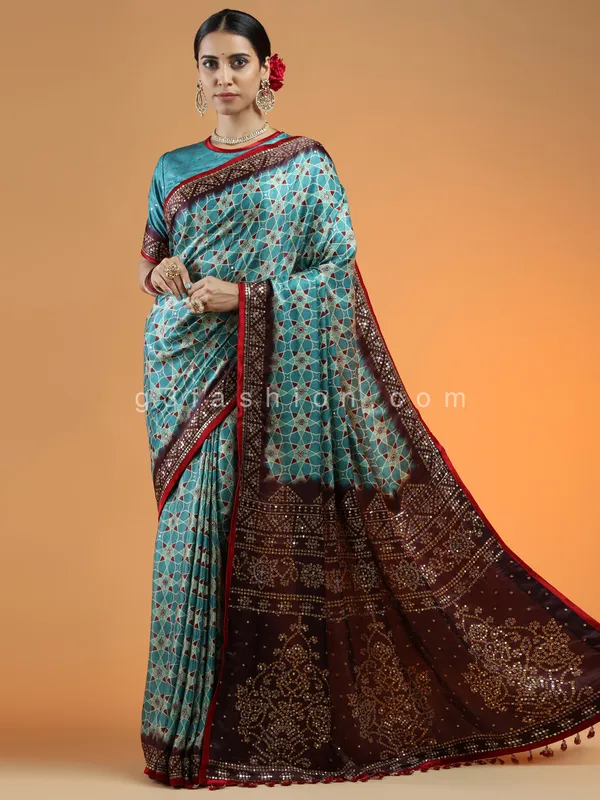 Teal green wedding wear printed saree in modal silk