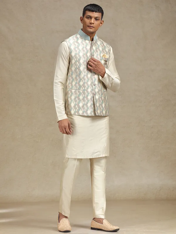 Cream and pista waistcoat set for festive occasions