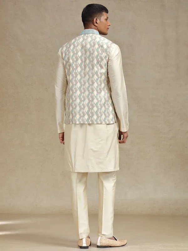 Cream and pista waistcoat set for festive occasions