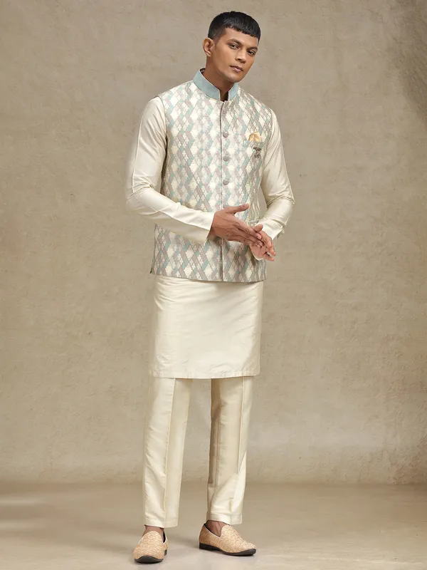 Cream and pista waistcoat set for festive occasions
