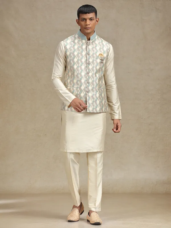 Cream and pista waistcoat set for festive occasions