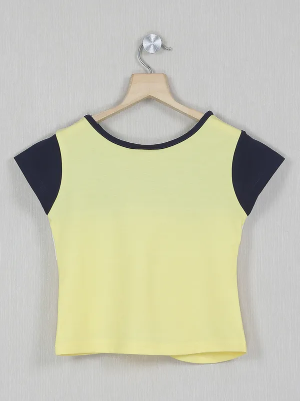 Tiny solid style yellow printed casual top for girls