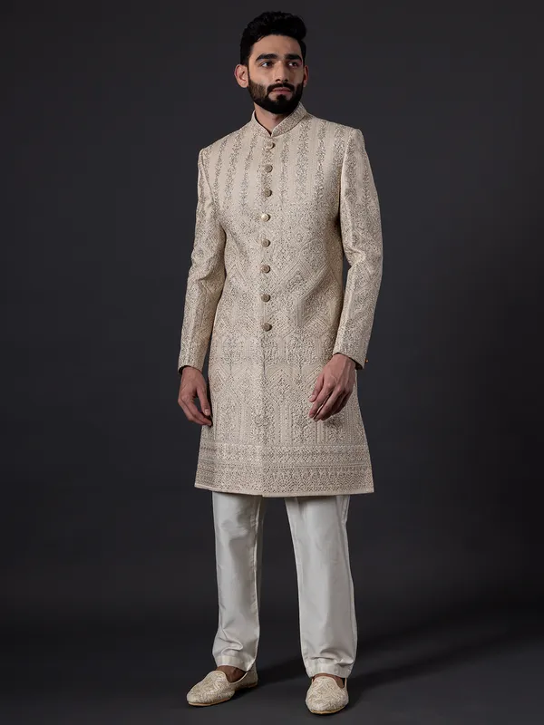 Traditional glimmerish beige silk sherwani for groom