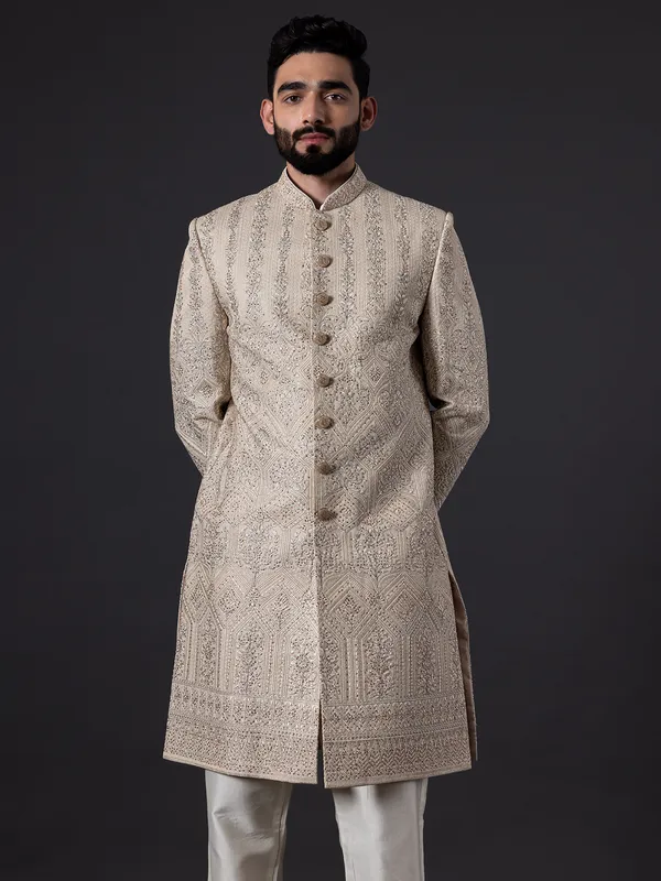 Traditional glimmerish beige silk sherwani for groom