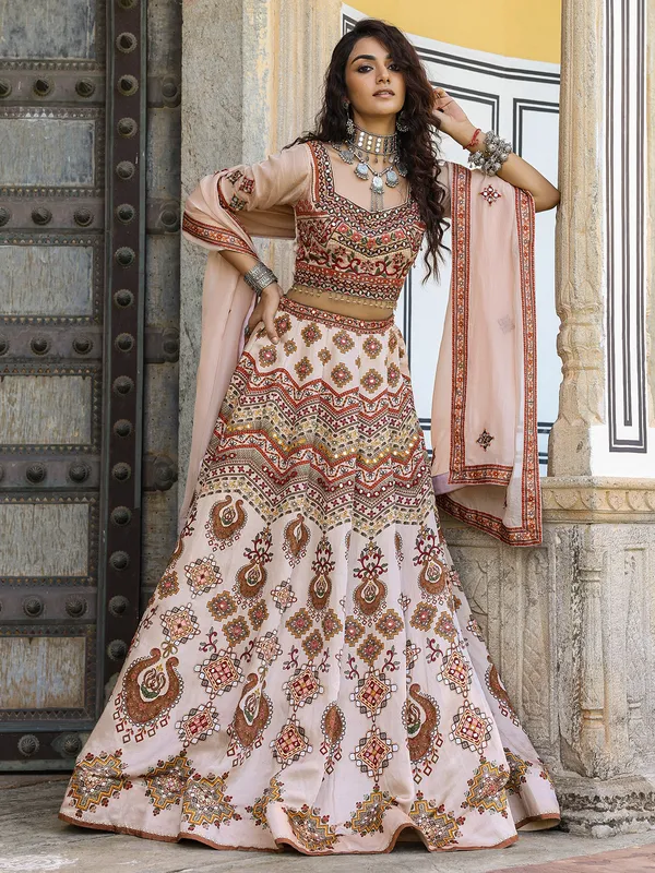 Traditional white and peach silk lehenga choli in print