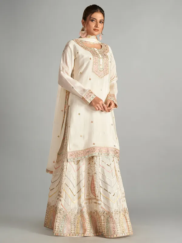 Trendy cream chiffon lehenga suit