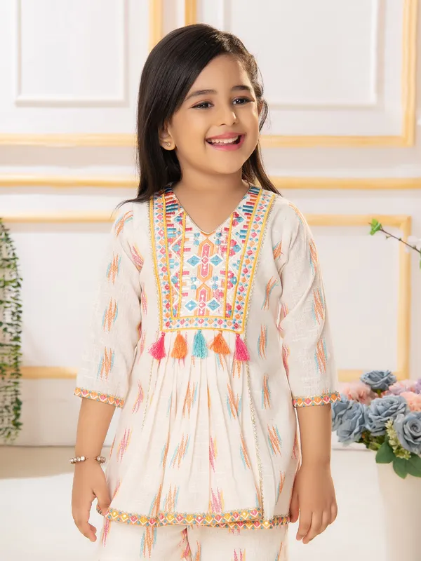 Trendy cream printed sharara suit in cotton