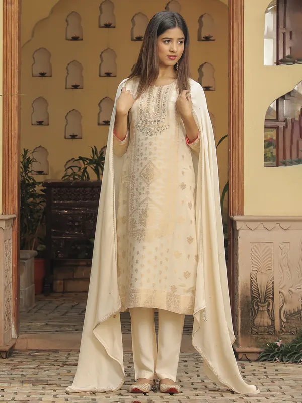 Trendy cream zari weaving kurti set