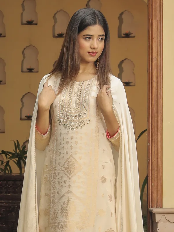 Trendy cream zari weaving kurti set