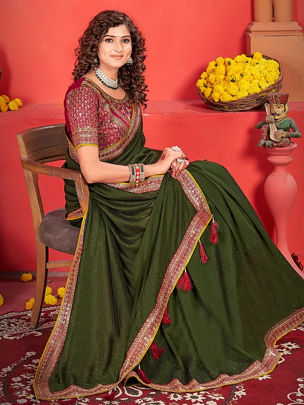 Trendy dark olive silk saree for festive