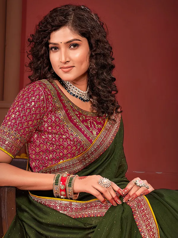 Trendy dark olive silk saree for festive