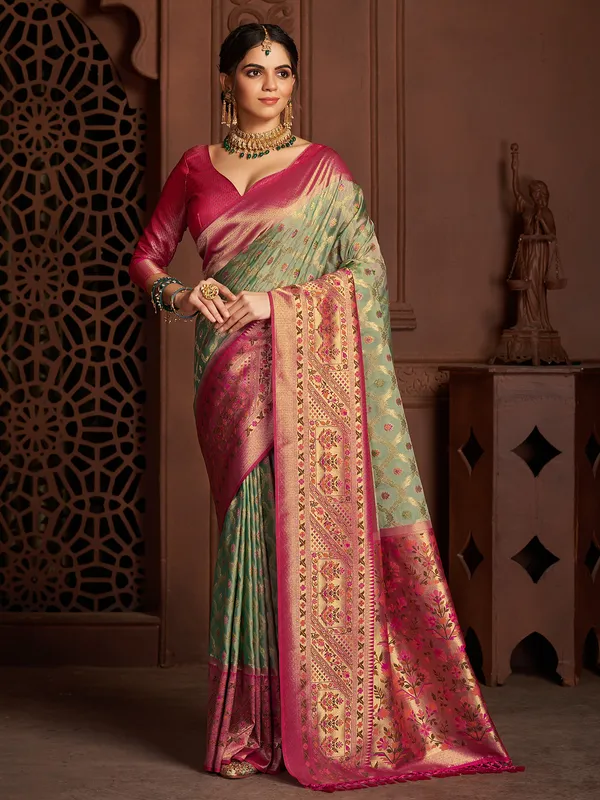 Trendy green silk zari weaving saree