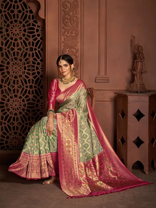Trendy green silk zari weaving saree