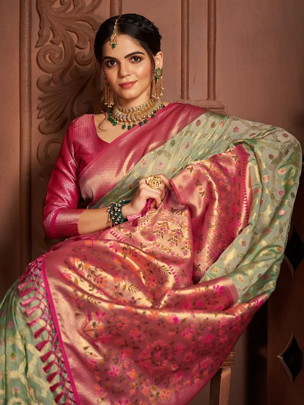Trendy green silk zari weaving saree