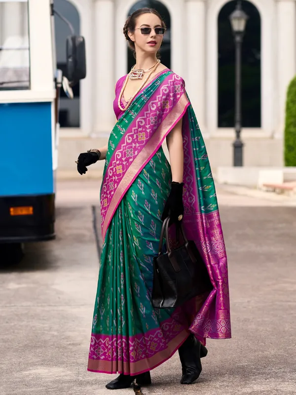 Trendy green soft silk zari weaving saree