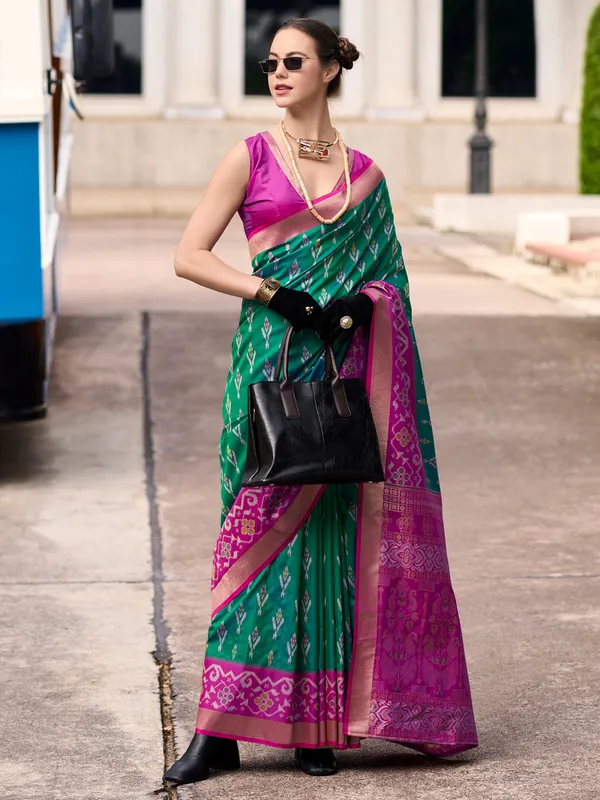 Trendy green soft silk zari weaving saree