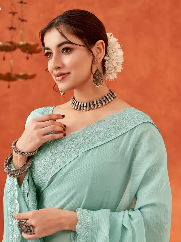 Trendy mint green chiffon saree