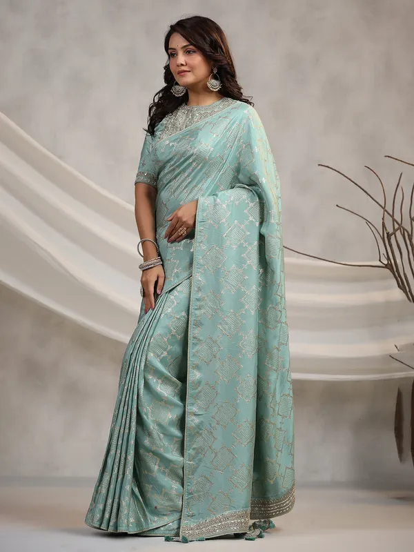 Trendy mint green silk wedding saree