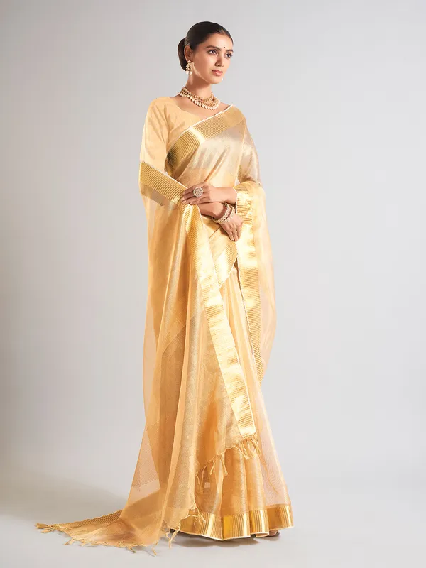 Trendy mustard yellow saree in tissue silk
