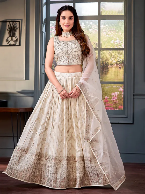 Trendy off-white lehenga choli with dupatta